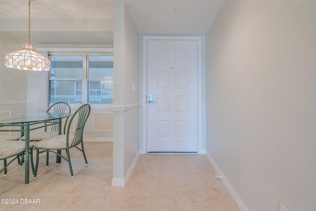 4 Oceans W Blvd Unit 407B, Daytona Beach Shores, FL 32118 - entryway featuring baseboards and light tile patterned flooring