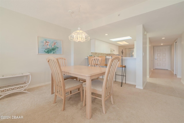 4 Oceans W Blvd Unit 407B, Daytona Beach Shores, FL 32118 - dining room featuring light colored carpet, a chandelier, baseboards, and recessed lighting