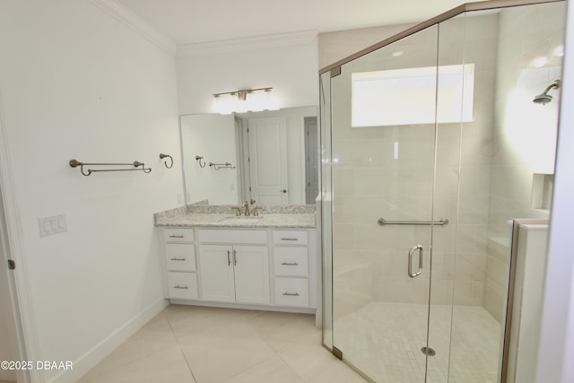 bathroom featuring a shower with shower door, vanity, tile patterned floors, and ornamental molding