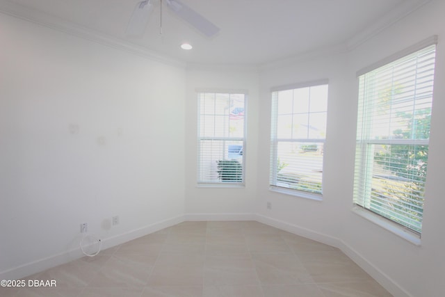 unfurnished room featuring ceiling fan, crown molding, and light tile patterned flooring