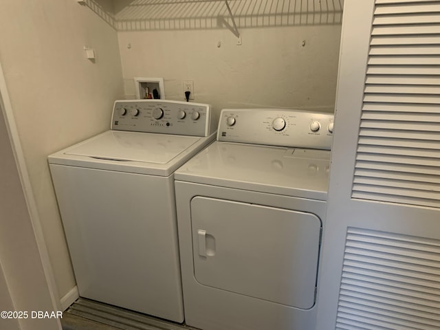 washroom with washer and dryer