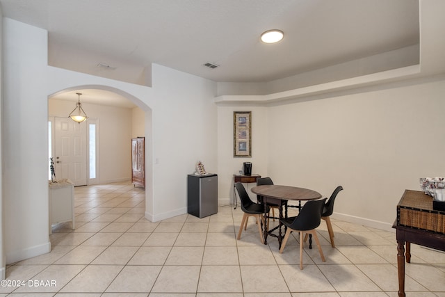 dining room featuring light tile patterned flooring