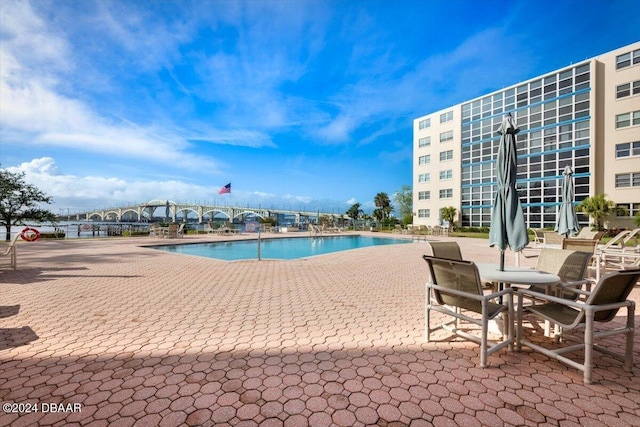 view of pool with a patio