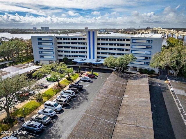 view of building exterior with a water view