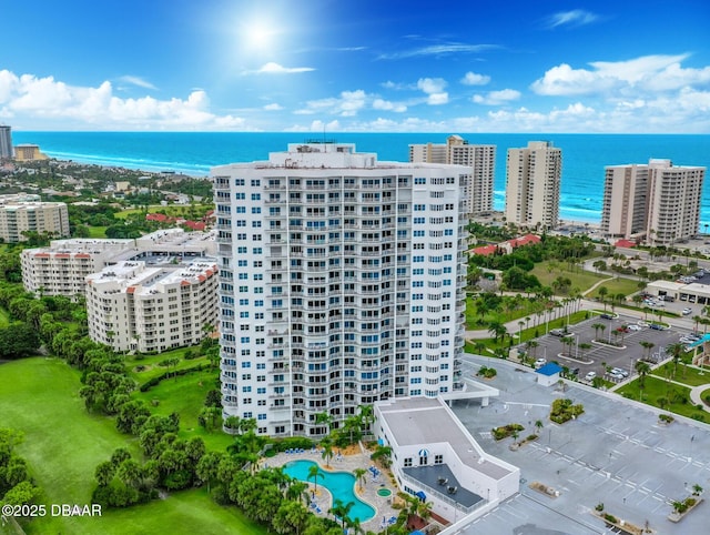 birds eye view of property featuring a water view