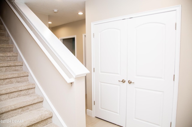 stairs with recessed lighting