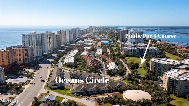 aerial view featuring a view of city and a water view