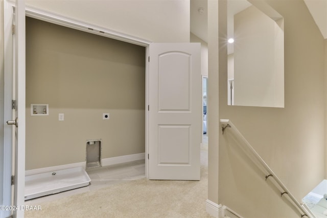 laundry room featuring baseboards, laundry area, electric dryer hookup, washer hookup, and light carpet