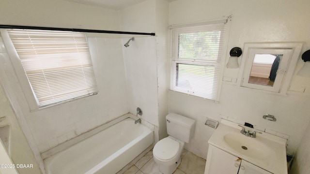 full bathroom featuring tile patterned flooring, shower / bathing tub combination, vanity, and a healthy amount of sunlight