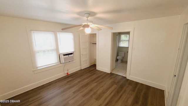 unfurnished bedroom with ensuite bathroom, ceiling fan, cooling unit, and dark hardwood / wood-style floors