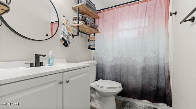 full bathroom with curtained shower, toilet, and vanity