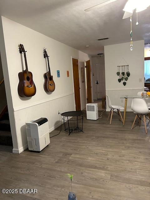 dining area with wood-type flooring