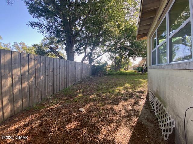 264 Sherwood Ln, Holly Hill, FL 32117 - view of fenced backyard