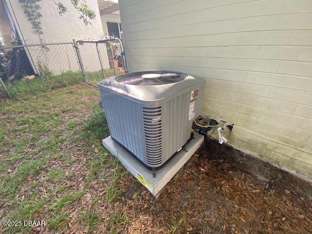 264 Sherwood Ln, Holly Hill, FL 32117 - exterior view of a central air condition unit