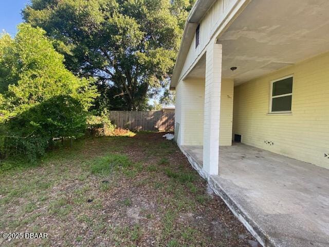 264 Sherwood Ln, Holly Hill, FL 32117 - view of yard featuring a carport