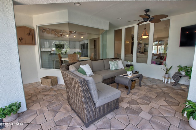 living room with ceiling fan