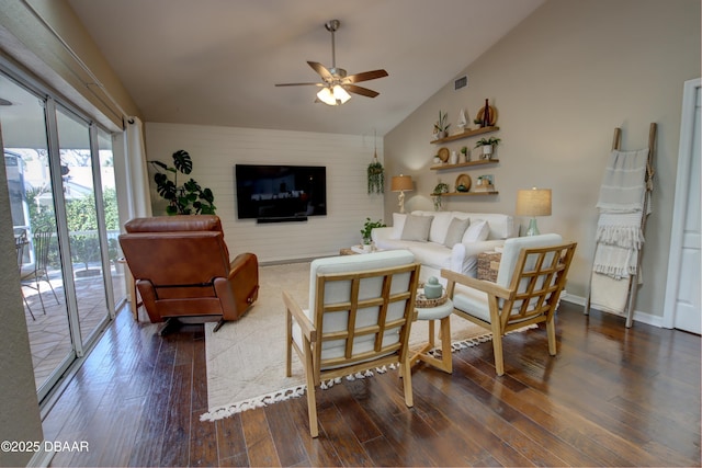 living room with high vaulted ceiling, dark hardwood / wood-style floors, and ceiling fan