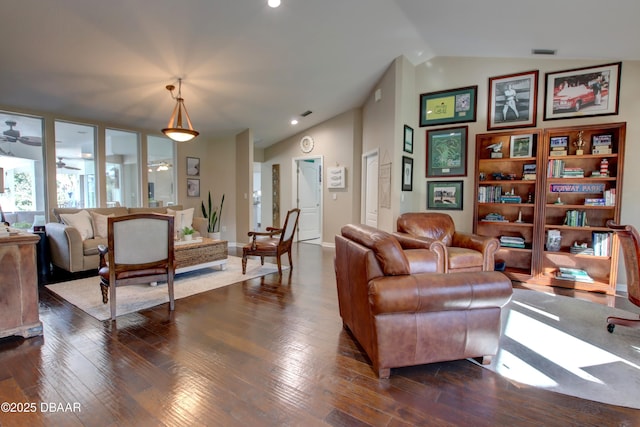 living room with vaulted ceiling, ceiling fan, and dark hardwood / wood-style flooring