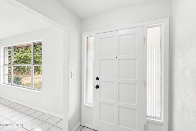 view of tiled foyer