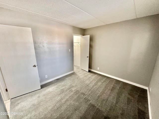 empty room with carpet flooring