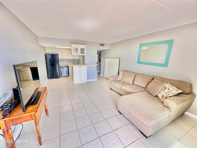 tiled living room with a textured ceiling