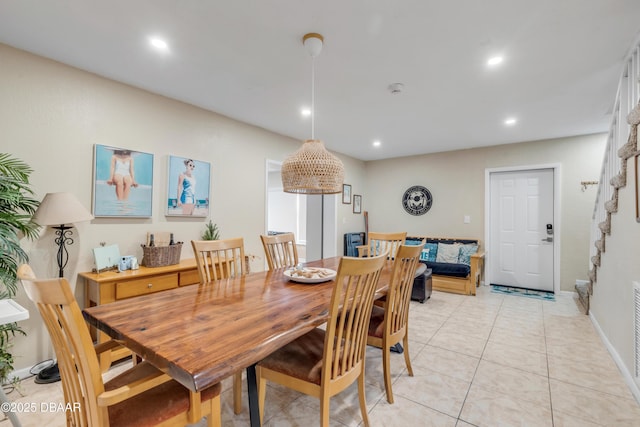 dining room with light tile patterned flooring