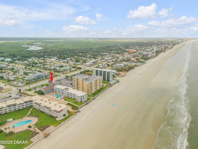 aerial view featuring a water view and a view of the beach