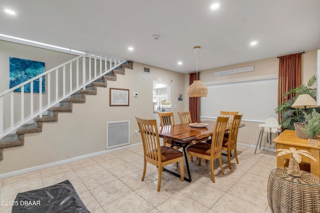 view of tiled dining space