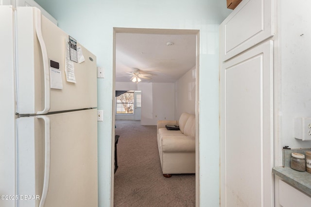 hallway with light carpet