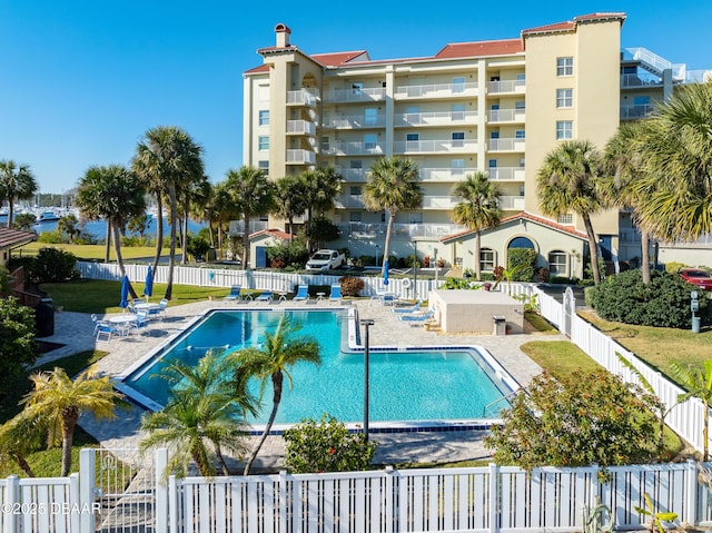 view of swimming pool featuring a patio area