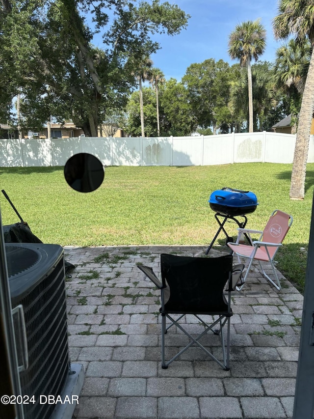 view of patio with central AC