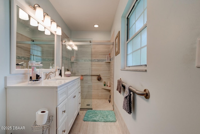 3630 Scott St, Port Orange, FL 32129 - bathroom with vanity, a stall shower, and recessed lighting