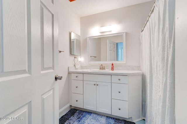 3630 Scott St, Port Orange, FL 32129 - bathroom featuring vanity and baseboards