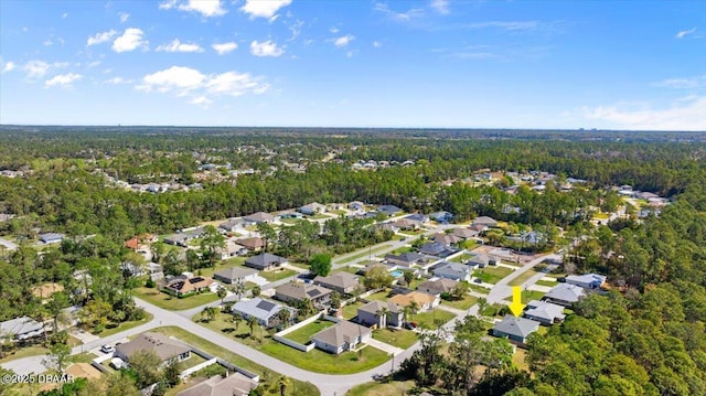 aerial view featuring a residential view and a forest view