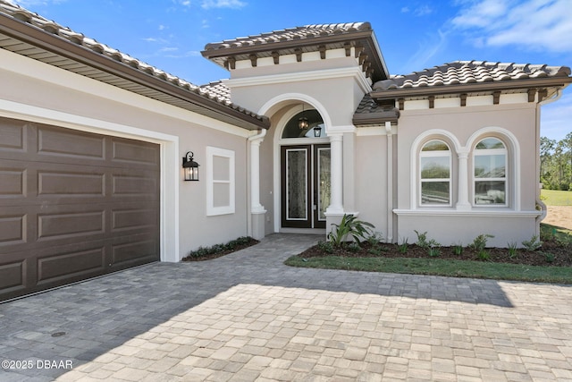 property entrance featuring a garage