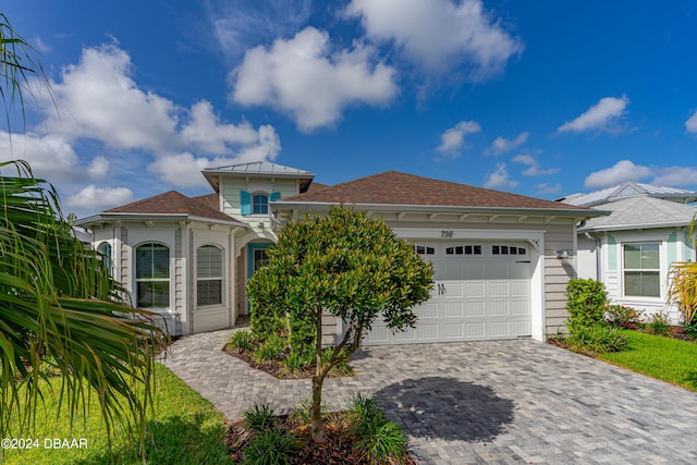 view of front of home with a garage