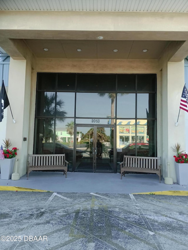 2043 S Atlantic Ave Unit 311, Daytona Beach, FL 32118 - property entrance with stucco siding