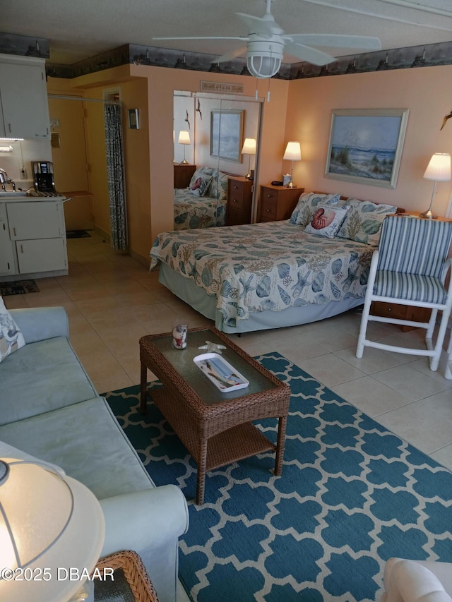 2043 S Atlantic Ave Unit 311, Daytona Beach, FL 32118 - bedroom with light tile patterned floors and a sink