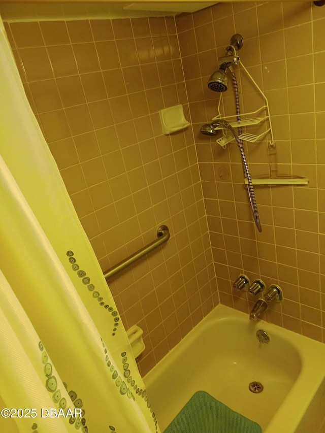 2043 S Atlantic Ave Unit 311, Daytona Beach, FL 32118 - full bathroom featuring shower / bath combination with curtain