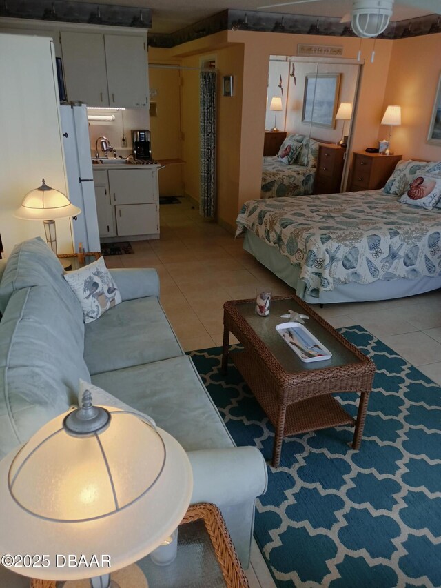 2043 S Atlantic Ave Unit 311, Daytona Beach, FL 32118 - living room with light tile patterned floors