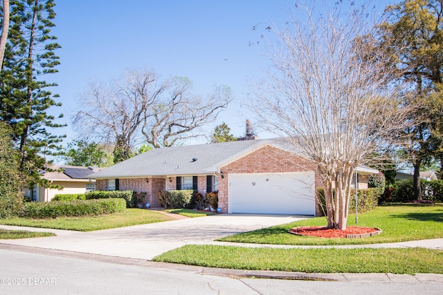 ranch-style house with driveway, brick siding, an attached garage, and a front yard