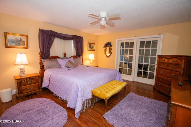 bedroom featuring ceiling fan, a textured ceiling, and wood finished floors