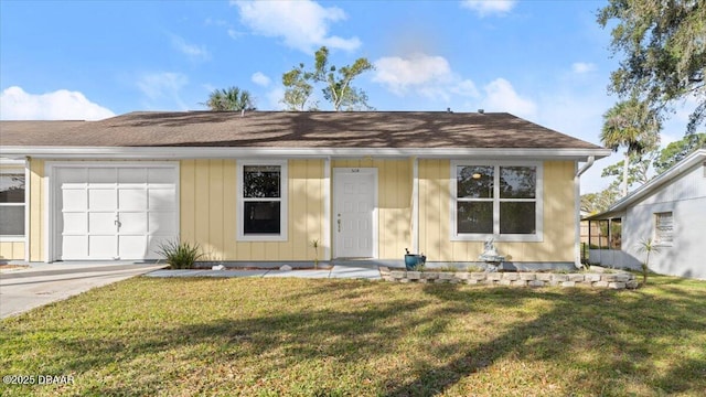 single story home with a garage and a front yard