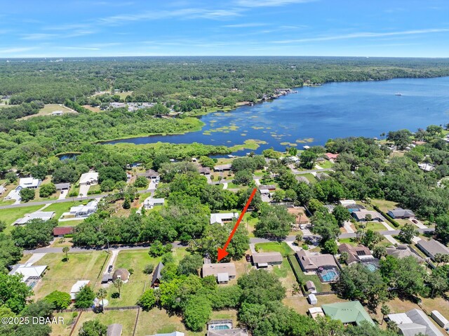 bird's eye view with a water view, a residential view, and a forest view