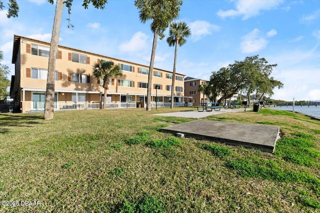 view of building exterior with a water view