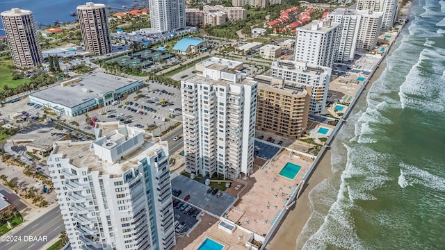 aerial view with a view of the beach and a water view