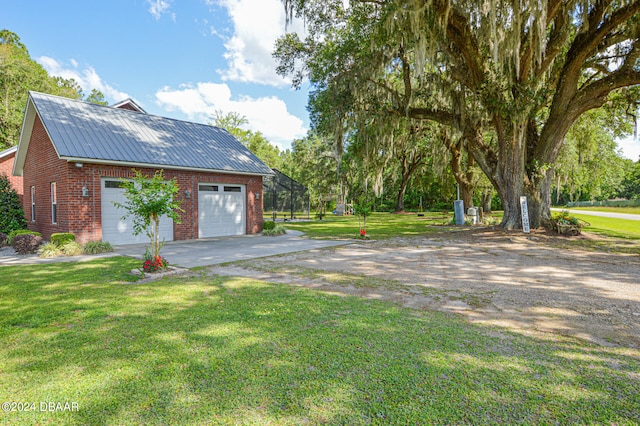 view of yard featuring a garage