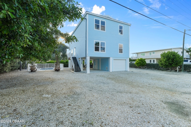 view of home's exterior with a garage