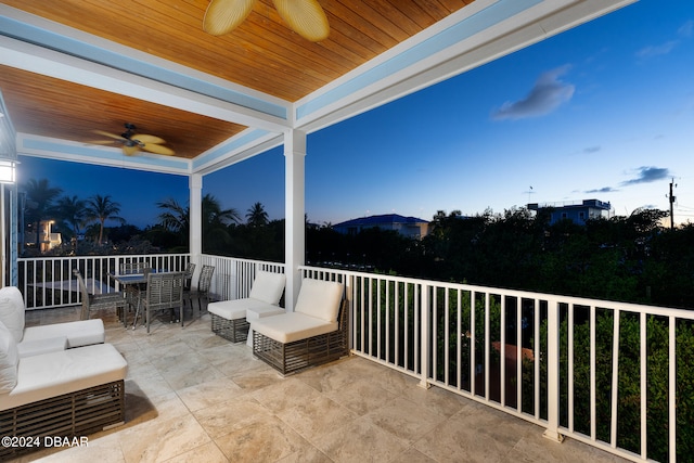 exterior space with outdoor lounge area and ceiling fan