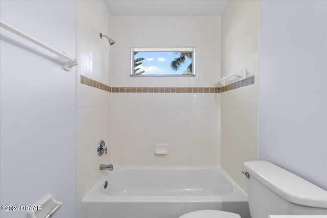 full bath with toilet and washtub / shower combination